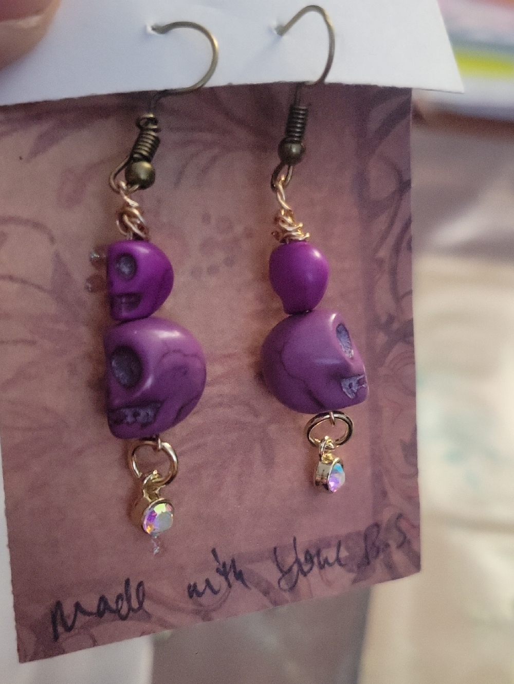 Purple Skull Drop Earrings with Iridescent Charm